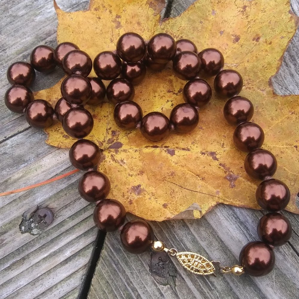 brown faux pearl knotted  necklace fishhook clasp with filigree detail classic